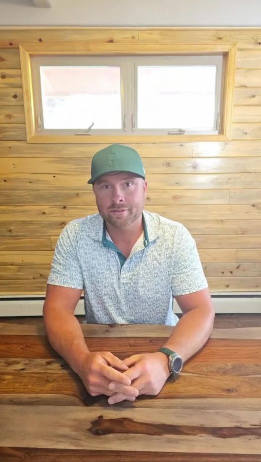 Cole Simmons explaining a mortgage topic at a table